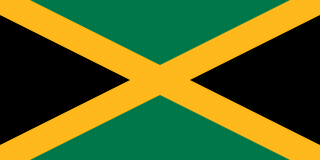 The flag of Jamaica is divided by a gold diagonal cross into four alternating triangular areas of green at the top and bottom, and black on the hoist and fly sides.