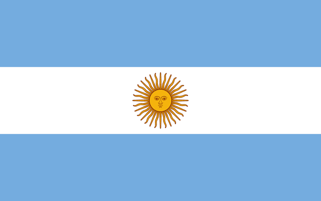The flag of Argentina features three equal horizontal bands of light blue, white and light blue. A brown-edged golden sun is centered in the white band.