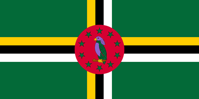 The flag of Dominica has a green field with a large centered tricolor cross. The vertical and horizontal parts of the cross each comprise three bands of yellow, black and white. A red circle, bearing a hoist-side facing purple Sisserou parrot standing on a twig and encircled by ten five-pointed yellow-edged green stars, is superimposed at the center of the cross.