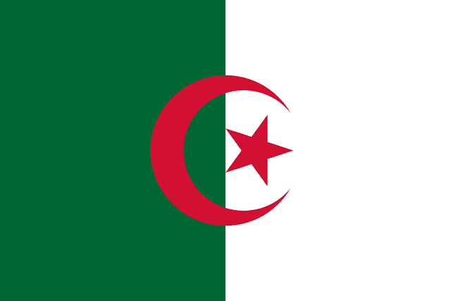 The flag of Algeria features two equal vertical bands of green and white. A five-pointed red star within a fly-side facing red crescent is centered over the two-color boundary.