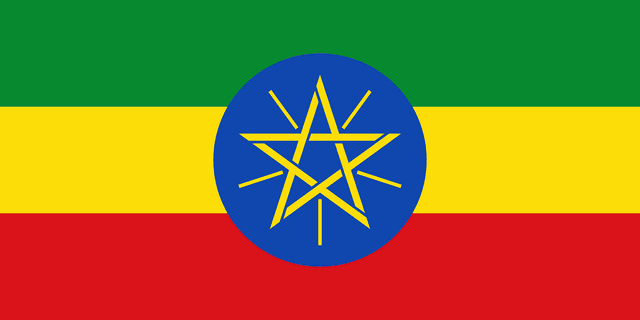 The flag of Ethiopia is composed of three equal horizontal bands of green, yellow and red, with the national emblem superimposed at the center of the field. The national emblem comprises a light blue circle bearing a golden-yellow pentagram with single yellow rays emanating from the angles between the points of the pentagram.
