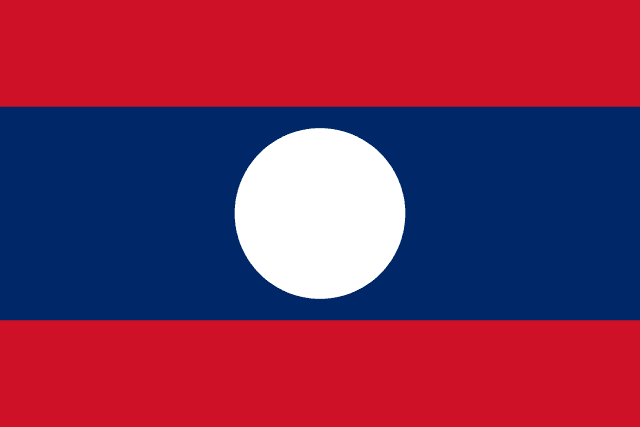 The flag of Laos is composed of three horizontal bands of red, blue and red. The blue band is twice the height of the red bands and bears a white circle at its center.