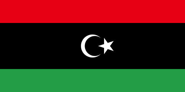 The flag of Libya is composed of three horizontal bands of red, black and green, with the black band twice the height of the other two bands. At the center of the black band is a fly-side facing white crescent and a five-pointed white star placed just outside the crescent opening.