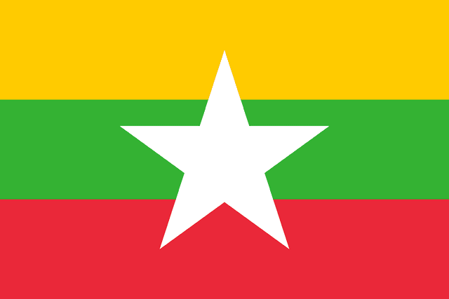 The flag of Myanmar is composed of three equal horizontal bands of yellow, green and red, with a large five-pointed white star superimposed at the center of the field.