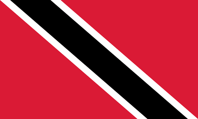 The flag of Trinidad and Tobago has a red field with a white-edged black diagonal band that extends from the upper hoist-side corner to the lower fly-side corner of the field.